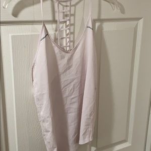 Light pink Lululemon workout tank